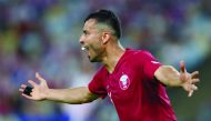 Qatar’s Bualem Khoukhi celebrates scoring their second goal during their Copa America match against Paraguay at the Maracana Stadium, Rio de Janeiro, Brazil, yesterday.