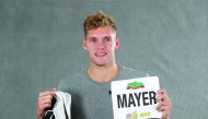 Kevin Mayer shows the shoes and the bib he wore when he set the decathlon world record for the decathlon during the Decaster meeting in Talence, France, on September 16, 2018. Mayer yesterday donated the kit to the IAAF Heritage World Athletics Championsh