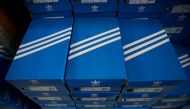 FILE PHOTO: Boxes of Adidas shoes are pictured in the warehouse of local footwear retailer 