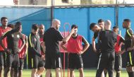 Coach Felix Sanchez offers tips to Qatari players during a practice session in Porto Alegre, Brazil yesterday, on the eve of their Copa America match against Argentina.