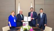  QOC President Sheikh Joaan and Secretary General of QOC, Jassim Al Buenain, pose for a photograph with Association of National Olympic Committees (ANOC) Senior Vice-President Robin Mitchel and ANOC Secretary General Gunilla Lindberg during an MOU signing