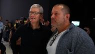 In this file photo taken on June 3, 2019 Apple CEO Tim Cook (L) and Apple chief design officer Jony Ive (R) look at the new Mac Pro during the 2019 Apple Worldwide Developer Conference (WWDC) at the San Jose Convention Center in San Jose, California. / AF