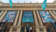 Traton SE posters are fixed at the entrance to the stock exchange in Frankfrut am Main, western Germany, where took place the launch of the company's initial public offer on June 28, 2019.  AFP / DPA / Boris Roessler 