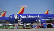 Southwest Airlines' Boeing 737 MAX aircraft are parked on the tarmac after being grounded at the Southern California Logistics Airport in Victorville on March 28, 2019. AFP/Mark Ralston