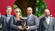 The winners of the Qatar Prix Jean Prat receiving the trophy from Qatar Racing & Equestrian Club’s Board Member, Ahmad Mohammed Alabdulmalik, in Deauville, yesterday.
