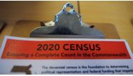 An informational pamphlet is displayed at an event to mark the one-year-out launch of the 2020 Census efforts in Boston, Massachusetts, April 1, 2019. Reuters/Brian Snyder