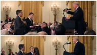 FILE PHOTO: A White House staff member reaches for the microphone held byJim Acosta of  CNN as he questions Donald Trump during a news conference, November 7, 2018. Reuters/Jonathan Ernst