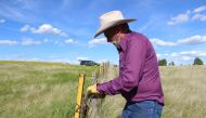 K.C. Weingart fixes a barbed wire fence on his ranch in Petroleum, County in northeastern Montana, USA on June 13, 2019. Thomson Reuters Foundation/Gregory Scruggs