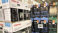 In this file photo taken on May 13, 2019 Air conditioners which were manufactured in China are available for sale in a Home Depot store in Los Angeles, California. (AFP / GETTY IMAGES NORTH AMERICA / MARIO TAMA)