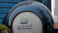FILE PHOTO: The logo of Qatar Petroleum is seen at its headquartes in Doha, Qatar, July 8, 2017. (REUTERS)
