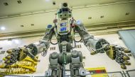 This handout picture taken on July 26, 2019, and released by the official website of the Russian State Space Corporation ROSCOSMOS on August 21, 2019 shows Russian humanoid robot Skybot F-850 (Fedor) being tested ahead of its flight on board Soyuz MS-14 s