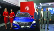 The Auto Class Cars officials Karim Monir, Head of Marketing; Hesham Al Sahn, General Manager; and Tamer Abdallah, MG Brand Manager; pose during the launch of MG5 in Doha on Wednesday evening. Pic: Salim Matramkot/The Peninsula