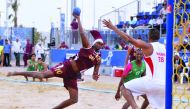 A Qatari beach handball player in action in this file photo.