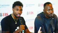 Noah Lyles of the US and Alex Wilson (R) of Switzerland during a press conference. Reuters/Arnd Wiegmann 