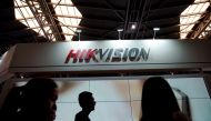 People visit a Hikvision booth at a security exhibition in Shanghai, China May 24, 2019. Reuters/Aly Song