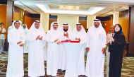 Qatar Chamber Chairman Sheikh Khalifa bin Jassim Al Thani (third right) and other officials during the event.