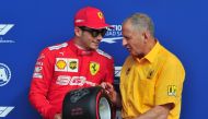 Ferrari's Charles Leclerc celebrates qualifying in pole position REUTERS/Jennifer Lorenzini