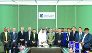 Doha Bank CEO Dr R Seetharaman and other officials with Chinese delegation members, during the event.