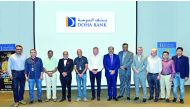 Doha Bank CEO Dr R Seetharaman (fourth left), and other officials during the event.