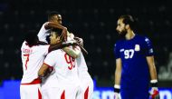 Al Arabi players celebrate after scoring one of their five goals against Umm Salal duing their QNB Stars League match played at the Al Janoub Stadium, yesterday.