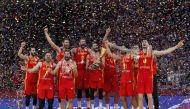 Spain's Rudy Fernandez lifts the trophy to celebrate winning the FIBA World Cup REUTERS/Kim Kyung-Hoon