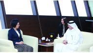 H E Ahmad bin Mohammed Al Sayed (right), Minister of State and Chairman of Qatar Free Zones Authority, discussing investment opportunities with Yin Yicui, Chairwoman of the Shanghai People’s Congress, in his office in Doha, yesterday. 