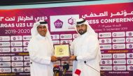 Khalid Mubarak Al Kuwari, Director of Marketing and Communications, QFA, and Ali Ibrahim Al Sulaiti, Public Relations Manager, Qatargas following the launch of third Qatargas U-23 League season at Al Bidda Tower, yesterday. 