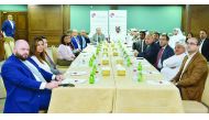 Qatar Chamber’s First Vice-Chairman Mohamed bin Ahmed bin Towar Al Kuwari (centre right) with Head Representative of the Ukrainian Union of Industrialists and Entrepreneurs in Qatar, Mykhailo Lukashev (centre left), and other Qatari and Ukrainian business