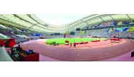 Technical staff members work on final arrangements at the Khalifa International Stadium, the main venue for the IAAF World Championships Doha 2019, yesterday. Pictures: Abdul Basit / The Peninsula
