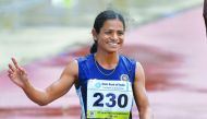 India’s Dutee Chand waves to the crowd after her race in this file picture. 
