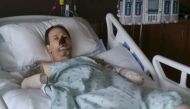Gravely ill, Greg Manteufe lost parts of his arms and legs, as well as the skin of his nose and part of his upper lip. The cause was capnocytophaga (cap-noh-seye-TOE'-fah-gah), a germ from Ellie's mouth or from another dog he encountered. Photo courtesy: 