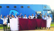 The members of the Qatari showjumping team, officials and supporting staff celebrate after winning the second place at the Olympic Qualifying event in Rabat, Morocco to book a ticket to Tokyo, yesterday.   
