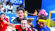 Spanish and Brazilian  players vie for the ball possession during their beach soccer preliminary round match at Katara. Picture: Nassos Triantafyllou / Laurel Photo Services