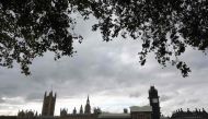 Britain's House of Parliament are pictured across the River Thames in London, on October 15, 2019. AFP / ISABEL INFANTES