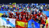 Spain’s beach soccer team’s players celebrate after winning gold medal yesterday.  (Laurel Photo Services) 