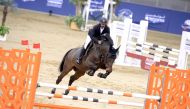 Hamad Nasser Al Qadi guiding Hugo Z over a hurdle during the Small Tour competition yesterday. 	