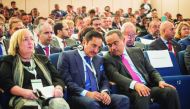The Minister of Commerce and Industry, H E Ali bin Ahmed Al Kuwari (right), and Qatar Chamber Chairman Sheikh Khalifa bin Jassim Al Thani (centre) attending the Arab-Italian Business Forum in Milan, Italy. 