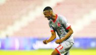Al Duhail’s Mohammed Muntari celebrates after scoring their winning goal against Umm Salal during the QNB Stars League match played at the Al Arabi Stadium, yesterday.