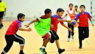 School students playing handball during the School Olympic Program in this file picture.