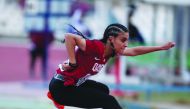 Qatar’s Ala Riad competing in the 100 metres hurdles final during the 6th GCC Women’s Games in Kuwait City, yesterday. Farid won the silver medal.