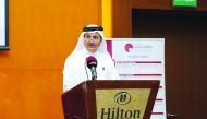 Qatar Chamber Chairman Sheikh Khalifa bin Jassim Al Thani, speaking during the opening session of the symposium on local and international arbitration at the Hilton Doha Hotel yesterday. 