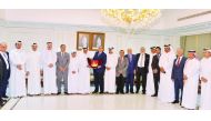 Qatar Chamber Chairman, Sheikh Khalifa bin Jassim Al Thani, presenting a memento to the visiting Jordanian trade delegation head Nael Al Kabariti during the event. 