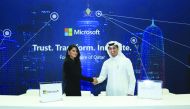 Yousef Al Naama (right), CEO at malomatia; with Lana Khalaf, Country Manager of Microsoft Qatar, announcing their partnership agreement at QITCOM 2019 yesterday. 