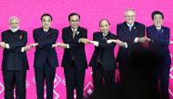 India's Prime Minister Narendra Modi, Chinese Premier Li Keqiang, Thai Prime Minister Prayuth Chan-Ocha, Vietnam's Prime Minister Nguyen Xuan Phuc, Australia's Prime Minister Scott Morrison and Japan's Prime Minister Shinzo Abe shake hands at the 3rd Regi