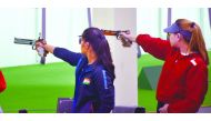 India’s Manu Bhaker (left) and Xiu Hong Teh of Singapore during the women’s 10m air pistol event at Losail shooting Range yesterday. Pic: Chinthana Wasala/The Peninsula