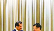 H E Ahmad Al Sayed (left), Minister of State and Chairman of QFZA meeting with a senior Chinese official.