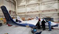 Technicians work on NASA's first all-electric plane, the X-57 Maxwell, at NASA's Armstrong Flight Research Center at Edwards Air Force Base, California, U.S., November 8, 2019. REUTERS/Mike Blake