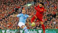 Manchester City's Kyle Walker in action with Liverpool's Mohamed Salah. Reuters/Phil Noble