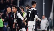 Juventus' Portuguese forward Cristiano Ronaldo (R) leaves the pitch after being substituted by Juventus' Argentine forward Paulo Dybala (L) during the Italian Serie A football match Juventus vs AC Milan on November 10, 2019, at the Juventus Allianz stadiu