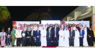 Participants of Total’s Al-Reyada Energy Seminar standing for a group picture at the closing ceremony. 